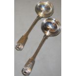 A pair of early Victorian silver sauce ladles, fiddle thread and shell pattern, crested, Maker