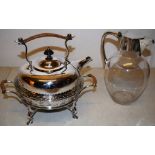 A late Victorian electroplated camping style kettle on basket stand, wicker handles, engraved a