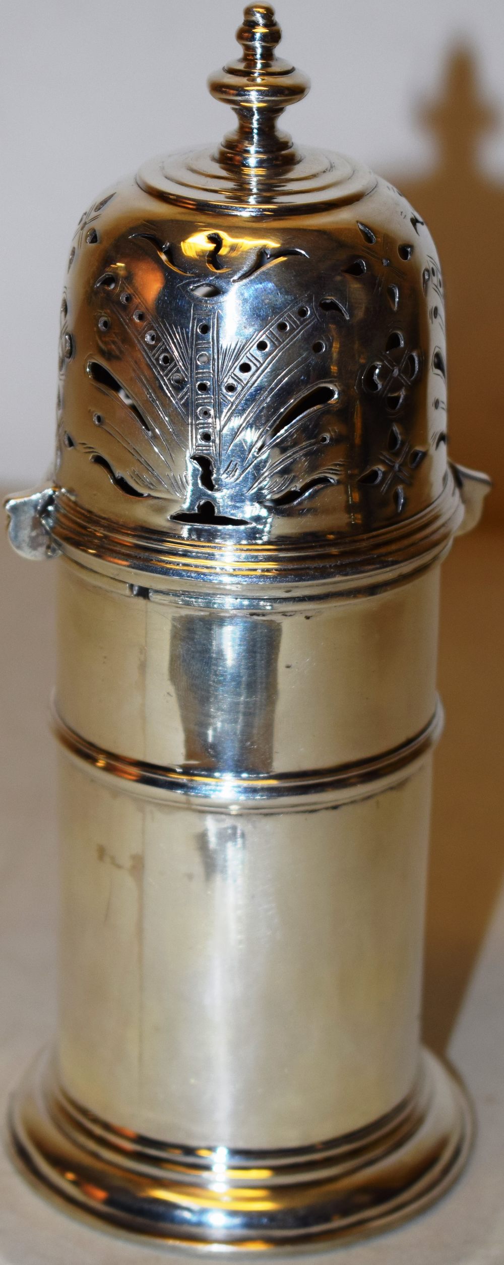 A silver copy of a Britannia Standard Queen Anne lighthouse caster, the pierced cover with a bayonet