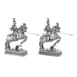 Pair of Silver "Jousting Knights" Garnitures