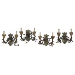 Four Continental Porcelain and Metal Sconces