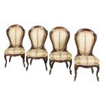 Four Rosewood "Ribbon Pattern" Side Chairs
