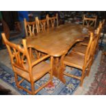 An unique circa 1997 Wych Elm Dining Suite comprising a beautiful burr detailed top dining table 1