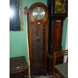 A 1930/40's Longcase Clock having three-train movement with arched Oak case generously glazed to