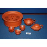 A modern Oriental red clay Teaset.