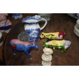 A Masons blue and white Vista jug, three porcelain Cow Parade cows, etc.