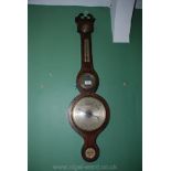 A Victorian Mahogany Barometer, with glass tube and mercury.