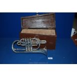 A silver plated Trumpet in box,