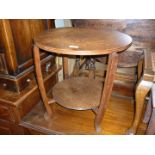 An Art Deco design circular Occasional Table having circular lower shelf/stretcher.