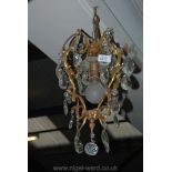 A brass and glass Chandelier