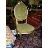 A pretty side Chair having cameo shaped buttoned back-rest and upholstered seat in pale olive green