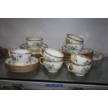 A Minton tea service including two bread and butter plates, twelve tea plates,
