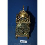 A small brass Smiths Carriage Clock with key