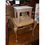 A carved seated Oak framed rectangular Stool having carved legs and a Mahogany Stool in the form of