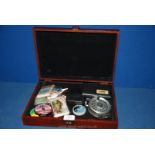 A painted Box with items of fly fishing and reel.