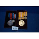 Two boxed commemorative Medals with their miniatures "The Queen's Golden Jubilee" with clasp "Royal