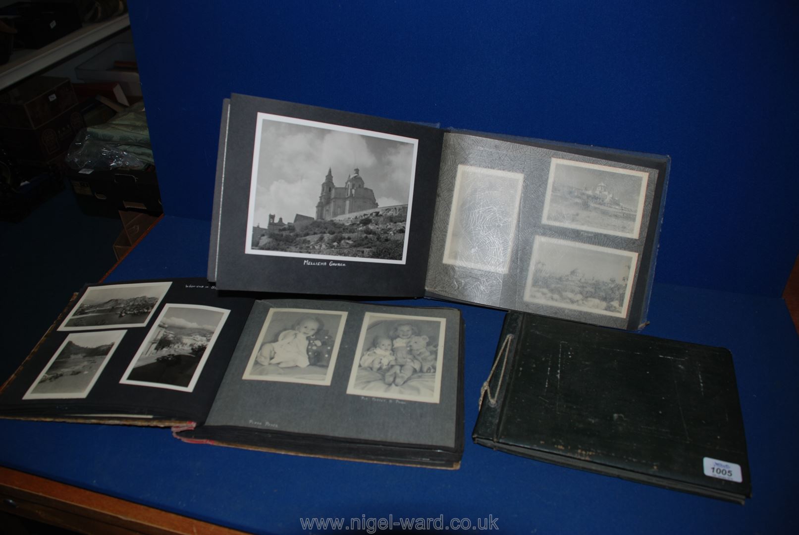 Three Scrapbooks having black and white photographs of children, etc.