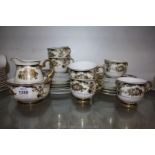 A Meito hand painted Teaset of six cups, saucers and side plates, cake plate,