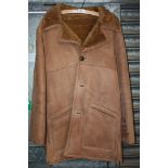 A gents Sheepskin coat, as new, 40'' chest.