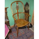 A mixed woods wheel-back Kitchen Elbow Chair having bent-wood arms and backrest,