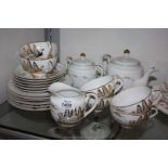 A Japanese lithophane Geisha Teaset of six cups, saucers and tea plates, sucrier and milk jug.