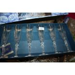A boxed set of six Melodia champagne flutes.