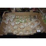 A quantity of glass including six sundae dishes, six green stemmed liqueur glasses, wine glasses,