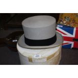 A grey Top Hat by Lock & Co, size 7 1/8.