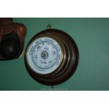 A circular aneroid Barometer