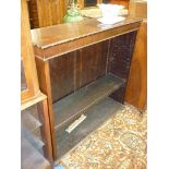 A Mahogany floor standing adjustable Bookshelves standing on compressed bun feet.