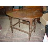 A c1900 oval Oak centre Table having two plank top,