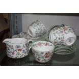 A Minton 'Haddon Hall' part teaset including six cups, six saucers, six side plates, milk jug,