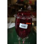 A large Cranberry glass Vase with frills.