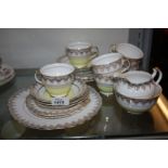 An Imperial yellow and gold part Teaset comprising six cups and saucers, five tea plates,