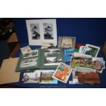An old postcard album and miscellaneous loose post cards,