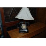 A Bakelite Telephone converted to a table lamp.