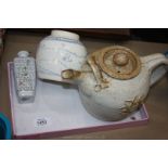 A large Earthenware teapot, a ginger jar (lacking lid) and an oriental bud vase.