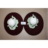 A pair of Worcester Grainger artichoke wall Pockets mounted on wall plaques.