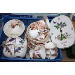 Four Royal Worcester 'Evesham' china cups and saucers, a Royal Worcester Herbs clock,
