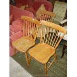 Three contemporary Ash-wood stick-back solid-seated kitchen Chairs.