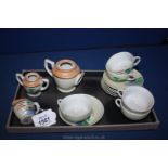 A miniature hand painted Japanese Teaset, (teapot a/f).