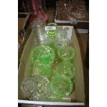 A green glass Dressing table set (one piece a/f), two glass candlesticks and a powder jar.