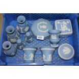 A quantity of Wedgwood Jasperware including three trinket pots with lids, salt and pepper pots,