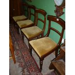 A set of four Mahogany framed dining Chairs having turned and fluted front legs,