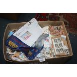 A large box of English loose stamps.