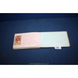 An autograph book with entries dating 1915/1916 etc.