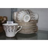 An Imperial bone china part Teaset highlighted with 22k gold comprising six saucers and tea plates