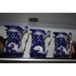 Three graduated Victorian flow blue Jugs