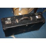 An old black leather Suitcase