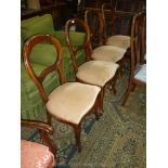 A set of four reproduction beige Dralon upholstered seated balloon-backed dark-wood Dining Chairs